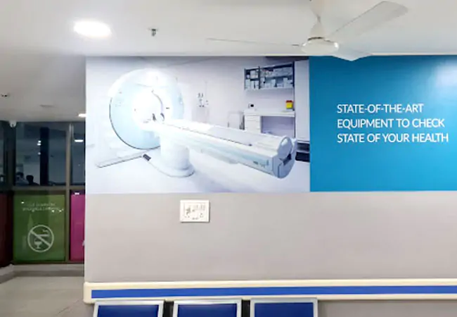 Hospital MRI room with modern branding elements by HashAdv and advanced diagnostic equipment.